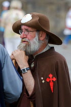 Man dressed up as an historical pilgrim at Santiago de Compostela, Spain, Galicia. July 2008.