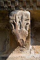 Medieval stone carving of Roe Deer (Capreolus capreolus), Pedro de Teverga Church, Somiedo, Asturias, Spain. July 2008.