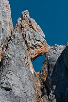 Natural rock arch, Cares Gorge, Picos de Europa National Park, Cantabria, Spain. July 2008.
