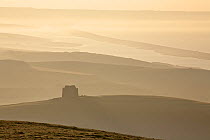 St. Catherine's Chapel, with the Fleet and Chesil Beach in the distance viewed from Abbotsbury Castle at dawn, Jurassic Coast World Heritage Site, Dorset, England, November 2006