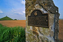 Commemorative stone and plaque near battlefield of the Battle of Waterloo, Eigenbrakel, Belgium, with Lion Hill memorial in the background.