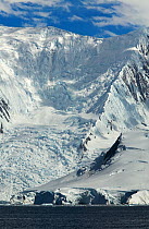 Coastal mountains after avalanche, Fournier Bay, Antarctica, February 2006