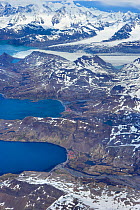 Aerial view of three old whaling stations: Leith, Stromness and Husvik, South Georgia, Antarctica, December 2006