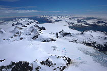 Aerial view from Briggs Glacier towards King Haakon Bay, South Georgia, Antarctica, December 2006