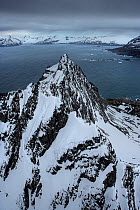 Aerial view of a mountain in front of King Haakon Bay, South Georgia, Antarctica, December 2006