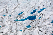 Aerial view of pools of meltwater on Peters Glacier, South Georgia, Antarctica, December 2006