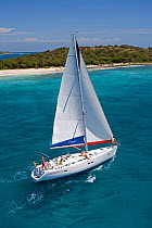 Sunsail yacht sailing in the British Virgin Islands, March 2006. Model released and property released.