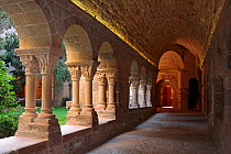 Stone pillars and sculpted capitals at cloisters of the St. Benet monastery, Barcelona, Catalonia, Spain.