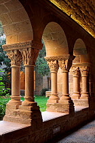 Stone pillars and sculpted capitals at cloisters of the St. Benet monastery, Barcelona, Catalonia, Spain.