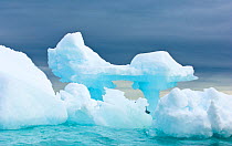 Blue iceberg off Spitsbergen, Svalbard, Arctic Norway, June 2009