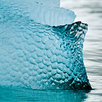 Patterns in blue iceberg off Spitsbergen, Svalbard, Arctic Norway, June 2009