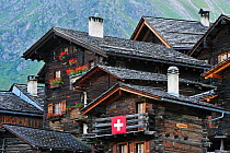 Traditional wooden houses / chalets in the Alpine village Grimentz, Valais, Switzerland, July 2009