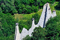 Pyramids of Euseigne, formed by erosion of soft rock below hard rock, Valais, Switzerland, July 2009