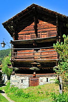 Traditional wooden granary / raccard near the Alpine village Grimentz, Valais, Switzerland, July 2009