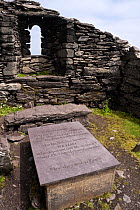 Lighthouse keeper's family's gravestone at the 7th Century monastery on Skellig Michael, The Skellig Islands, Ireland, May 2009.