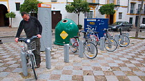 Bicycles for hire on street in Seville, Spain.