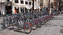 Bicycles for hire on street in Seville, Spain.