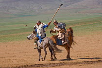 Re-enactement of a fight between an enemy and a soldier of the armies of Genghis Khan (emperor of the Mongol Empire) during the Genghis Khan Show, in Ulaanbaatar, Mongolia. The horses are Mongolian ho...