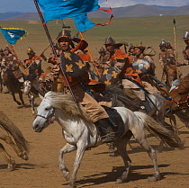 Re-enactement of an attack by the mounted armies of Genghis Khan (emperor of the Mongol Empire) during the Genghis Khan Show, in Ulaanbaatar, Mongolia. The horses are Mongolian horses. july 2007