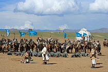 Re-enactement of the victory of the mounted armies of Genghis Khan (emperor of the Mongol Empire) over enemies (facing the ground) during the Genghis Khan Show, in Ulaanbaatar, Mongolia. The horses ar...