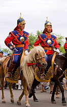 The Mongolian Cavalry opens the national Naadam festival, held during the National Holiday from July 11  13, in the National Sports Stadium, in Ulaanbaatar, Mongolia. The horses are Mongolian horses....