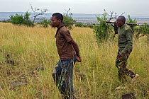 Poachers apprehended by Mara Conservancy anti-poaching patrol rangers, Caught with wildebeest and impala meat, Serengeti National Park, Tanzania, August 2006