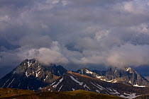 Clouds above Mount Svinica (2,301m) and Mount Kozi Wierch (2,291m) at sunset, High Tatras, Carpathian Mountains, Slovakia, June 2009