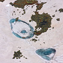 Alpine lakes created by melting snow, High Tatras, Carpathian Mountains, Slovakia, June 2009