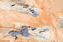 Aerial view of tourists at Namafjall, geothermal area near Lake Myvatn, Northern Iceland, June 2009