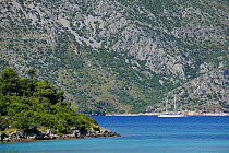 Dalmatian coast with a boat on the Adriatic sea near Korcula, Croatia, June 2009
