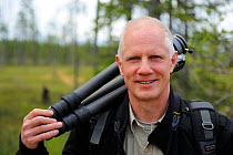 Photographer, Staffan Widstrand, on bear photo mission, Kuhmo, Finland, July 2009