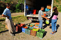 Mobile shop visiting a village, Lesser Lake Prespa, Lake Prespa National Park, Albania, June 2009