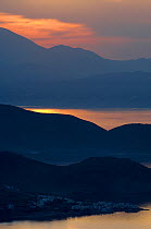 Sunset over Mochlos on the northeast coast of Crete, Greece, April 2009