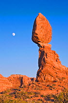 Moon rising over balanced rock, Arches NP, Utah, USA, January 2008