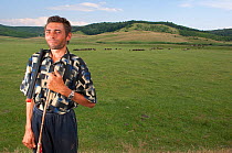 Shepherd with flock of sheep, Central Moldova, June 2009