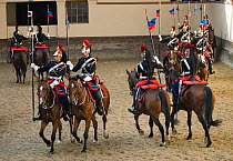 Mounted officers of the Garde Républicaine (Republican Guard), part of the French Gendarmerie, performing Le Carroussel des Lance, mounted on Selle Français horses at the Caserne des Célestins, Par...