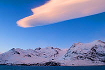 Lenticular clouds over the mountains bordering Gold Harbour, South Georgia, November 2006