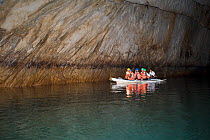 Tourists in a boat inside a cave, Puerto Princesa Subterranean River National Park, Palawan, Philippines, March 2009