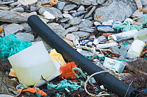 Rubbish washed up from sea on beach, Shetland Isles, Scotland, April 2009