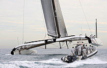 90ft catamaran "Alinghi 5", followed by a support RIB, in training prior to the first race of the 33rd America's Cup, Valencia, Spain. February 2010. ^^^A Deed of Gift race between defender Ernesto Be...