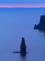Sea stack off the Cliffs of Moher at dusk, County Clare, Republic of Ireland, June 2009