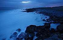 Coastline at night, Ailladie, The Burren, County Clare, Republic of Ireland, June 2009