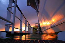 On deck of a trawler at sunset, North Sea, December 2009.