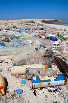 Plastic bottles and other debris washed up on beach. Gubal Island, Egypt, Red Sea.