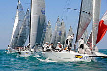 Melges fleet at the top mark, with "Viva" leading the fleet. Miami Grand Prix, Florida, USA. March 2010.
