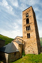 Tower of the Church of the nativity, Durro. Romanesque church from XII century, and UNESCO world heritage, in the Boí Valley, Pyrenees, Lleida, Catalonia, Spain. July 2009
