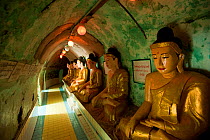 Buddhist statues within a temple, in Bago, Myanmar /  Burma.  August 2009