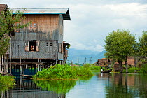 Floating houses in the waters of Inle Lake, Shan State, Myanmar, Burma. August 2009