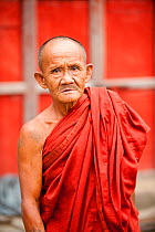 Portrait of an elderly Buddhist monk in Nyaungshwe,  Myanmar,  Burma. August 2009