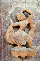 Details of teak wood carvings in Shwenandaw Kyaung Monastery, Mandalay, Mandalay Division, Myanmar, Burma. August 2009